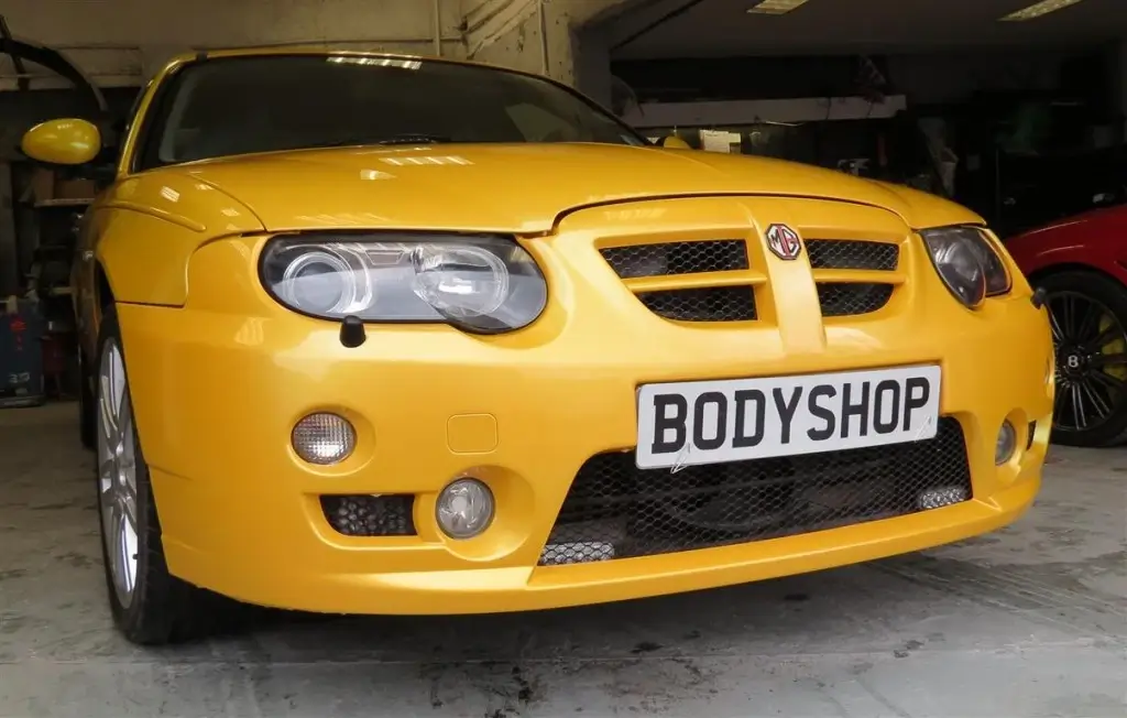 customised car with a new yellow paint job
